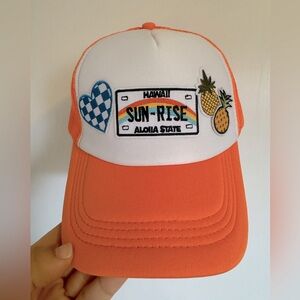 Orange snapback trucker hat with patches
